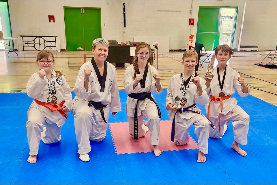 On Saturday, April 26, athletes from Heart & Soul Tae Kwon Do competed in the Yom Chi Martial Arts Tournament in Nelson, delivering strong performances and representing their school with pride. 
Christopher DeJong earned 1st place in Poomsae (patterns), 2nd in speed kicking, and 3rd in sparring.
Denik MacAskill took 1st place in speed kicking and 3rd in Poomsae.
Shylynn Ramsden placed 3rd in Poomsae, sparring, and speed kicking. L-R: Shylynn Ramsden, Master Jakki Van Hemert, Assistant Head Instructor Andonae vanStaden, Christopher Dejong, Denik MacAskill. 
