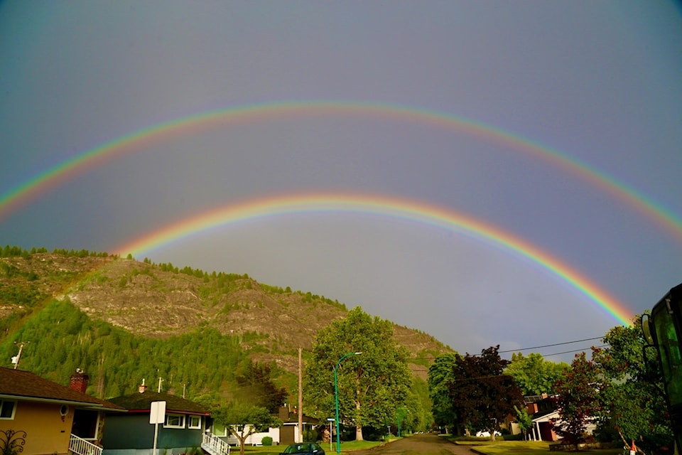 Ron Wilson captured this image of a double rainbow arching over the city. 