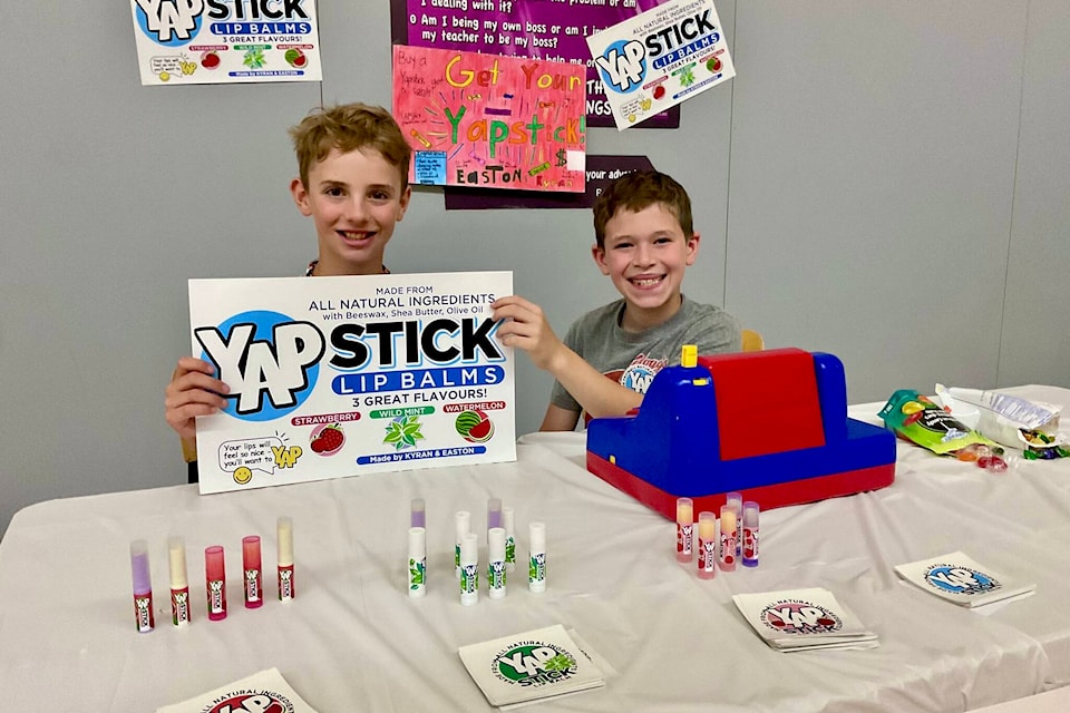 Kyran and Easton with their Yap Sticks. 