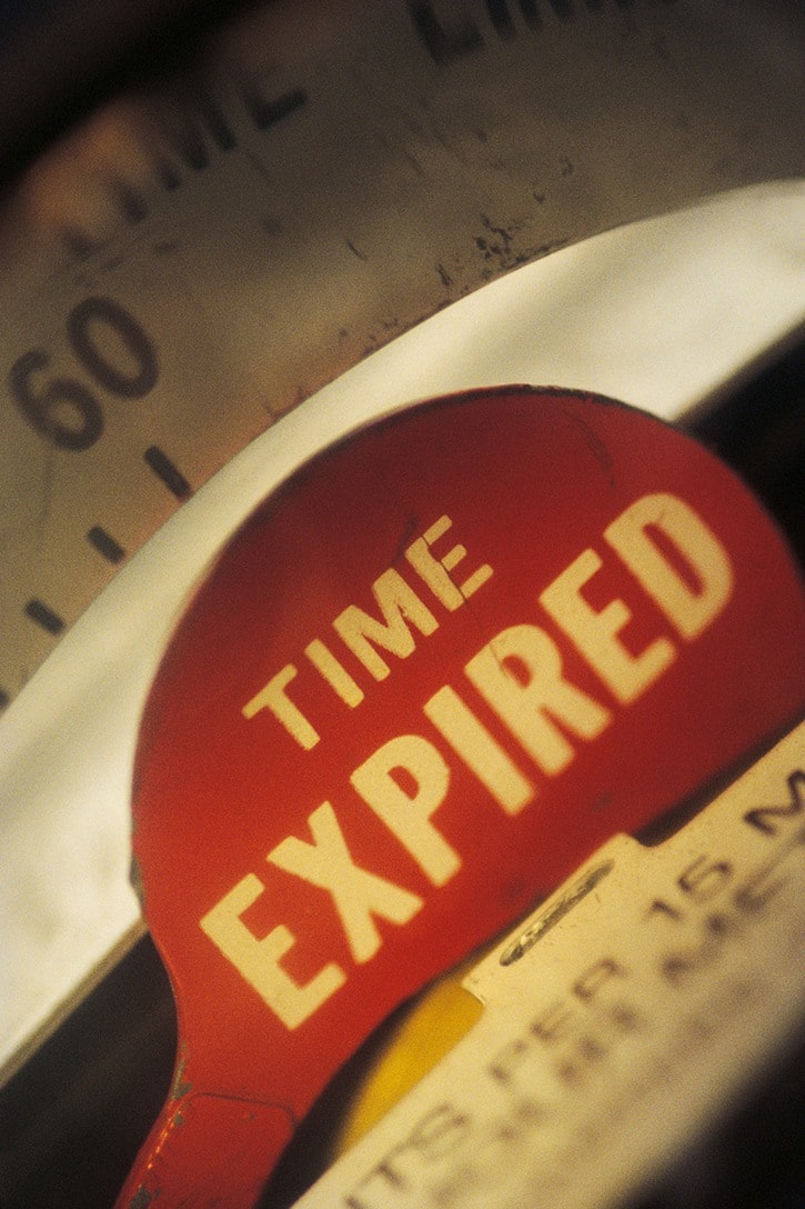 parking meter with time expired sign