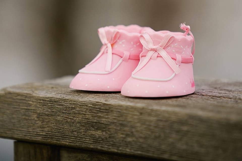 10047027_web1_180103-TDT-M-180104-TDT-baby-shoes