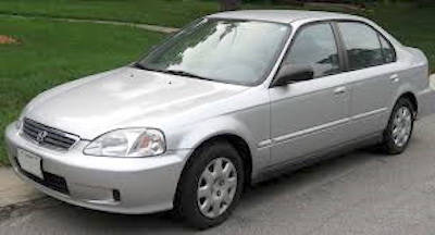 RCMP photos of 1999 Honda Civic, four-door sedan, grey in colour, tied to a suspicious death. (RCMP handout)