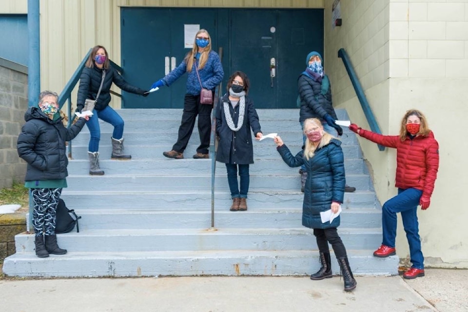 Four of the campaign volunteers were reimbursed $100 for helping to make the masks. Photo: Dave Cornelius