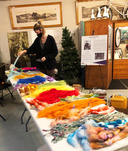 VISAC staff Ellie Knox prepping supplies for January art boxes. Photo: Submitted