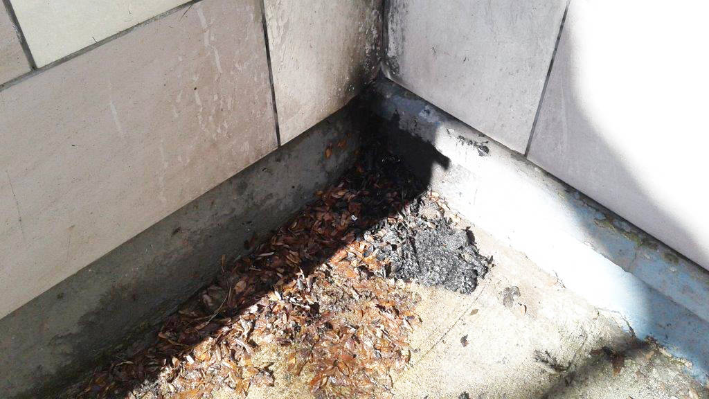 A fire was lit in a rain spout in the old CS Williams Clinic building. Photo: Trail RCMP