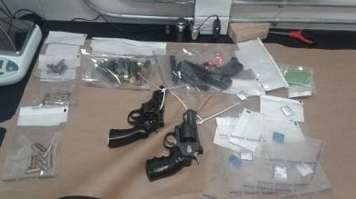 25137596_web1_210513-TDT-Guns-seized_1