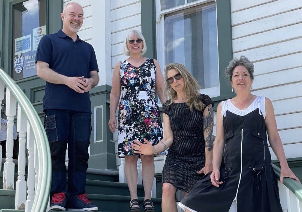 Celebrating the good news, L-R: Village of Kaslo CAO Ian Dunlop, Mayor Suzan Hewat, RDCK Area D director Aimee Watson, and Kaslo Housing Society chair Erica Bird. Photo: Submitted