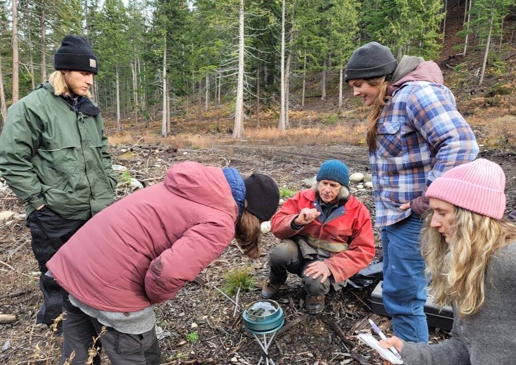 Gregoire Lamoureaux of Kootenay Permaculture trains members of the Youth Climate Corps at the Bannock in Bloom site. Photo: Submitted