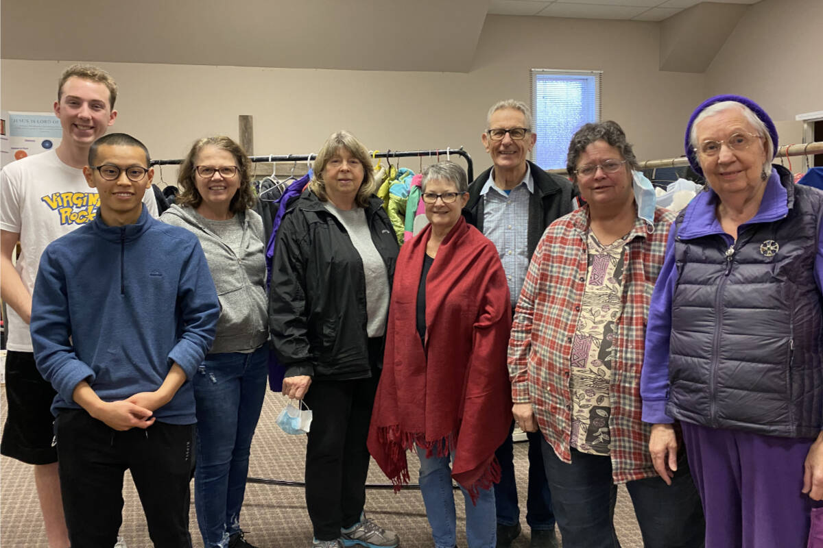 (L-R) Youth With a Mission Grand Forks Theodore, Renée and Caleb (front) pitched in with realtor Sharon Marshal, YWAMs Elsie and Larry Dannhauer, Rev. Cathy Straume and Joyce ODoherty to make this years Coats for Kids drive an unqualified success. Photo courtesy of Sharon Marshall