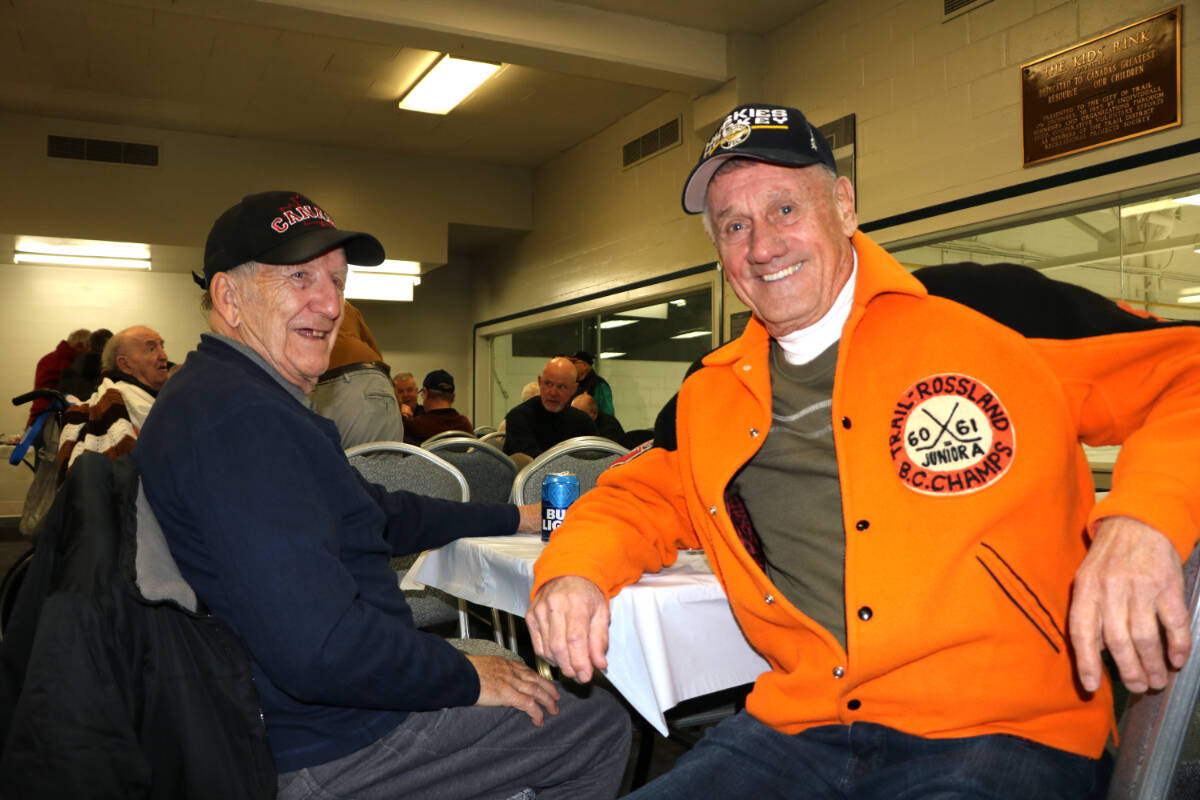 Gerry Godfrey with Albert Holms who is wearing his Junior A provincial championship jacket that still fits after 60 years.