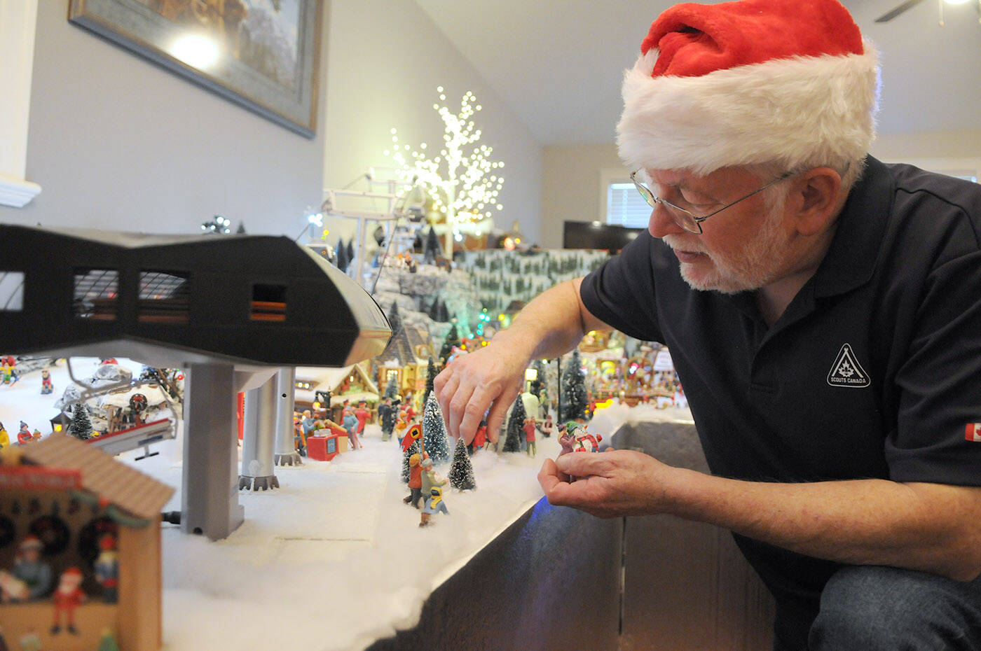 Terry Campbells display of Christmas miniatures takes up the entire living room of his Chilliwack home. He started the display in 2007 but it has been more challenging for him lately as hes been legally blind since 2018. (Jenna Hauck/ Chilliwack Progress)