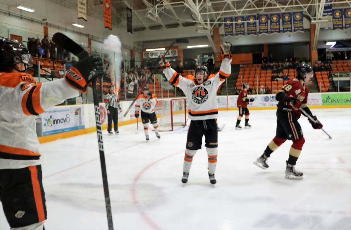 The Trail Smoke Eaters celebrate their fourth straight win.