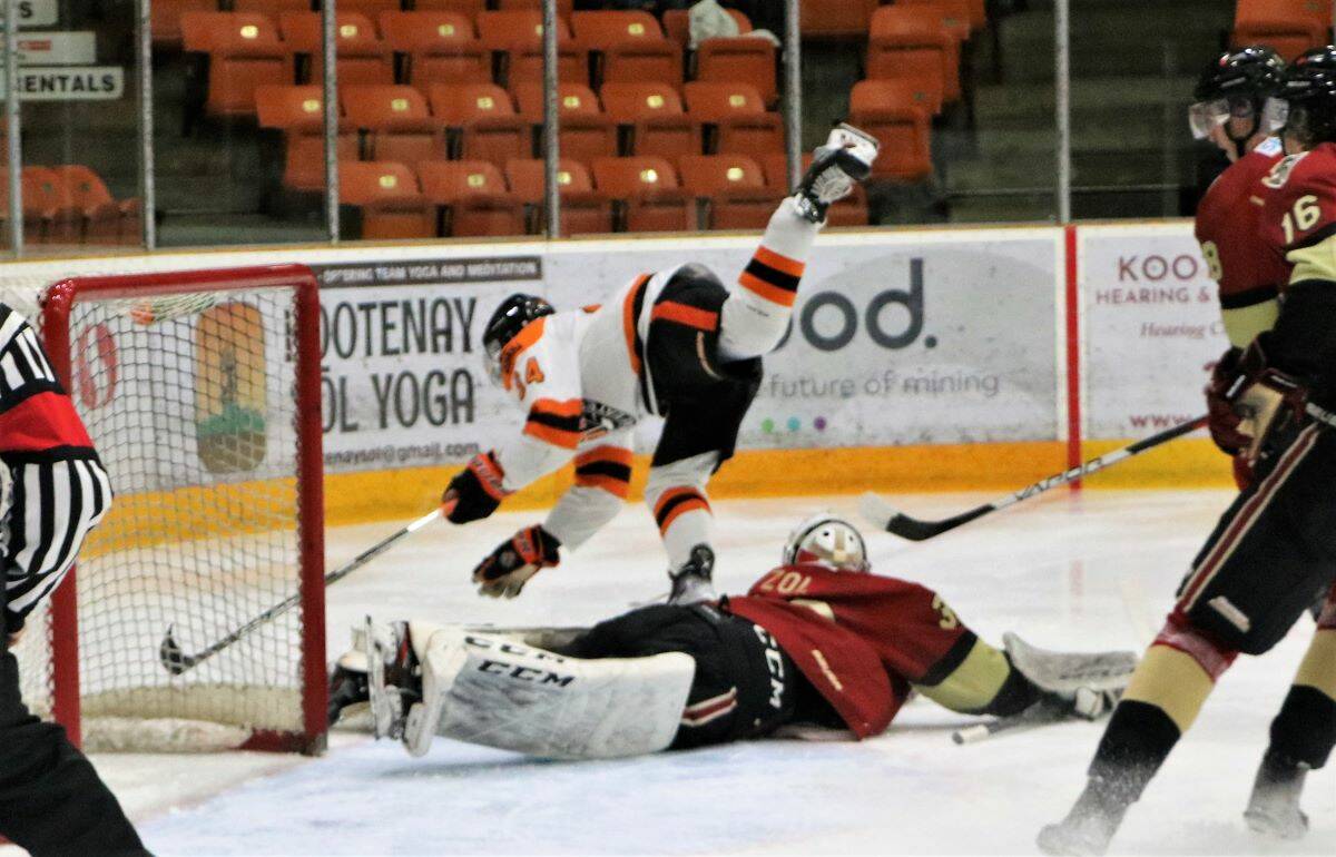 Trey Fechko gets airborn on this stop by the Warriors goalie