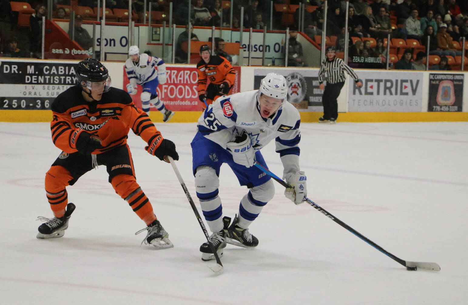 Vees forward Jackson Niewendyk tries to make a move around Trail defenceman Jordan Hendry. Photo: Jim Bailey