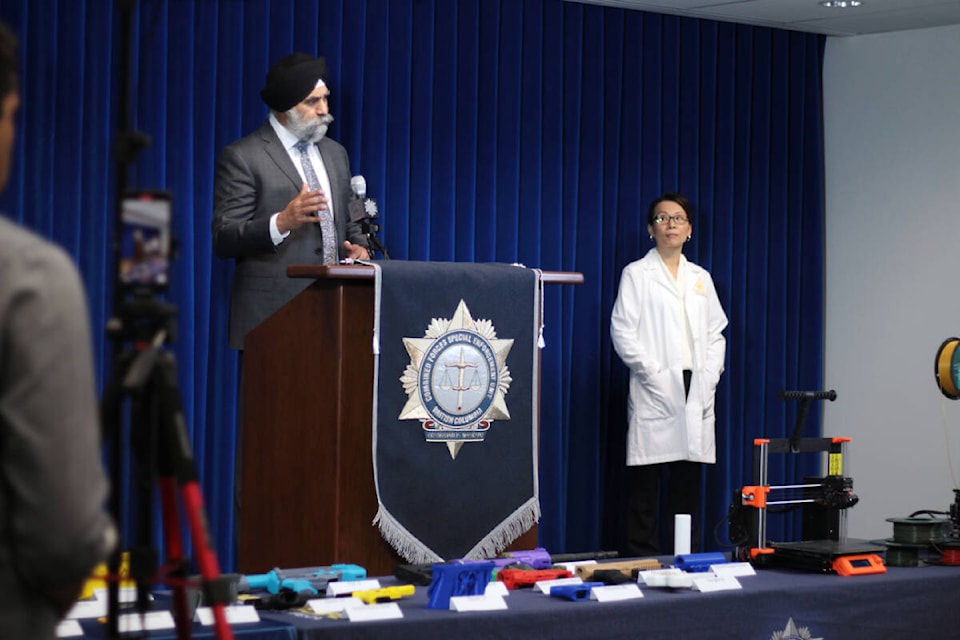From left: Staff Sgt. Baltej Dhillon, program manager for CFSEU’s crime guns investigative and intelligence group, and Provincial Forensic Firearms Lab manager Daisy Wong during a media briefing Tuesday (July 11, 2023) warning the public, parents and their children of the dangers of 3D printers. (Lauren Collins)