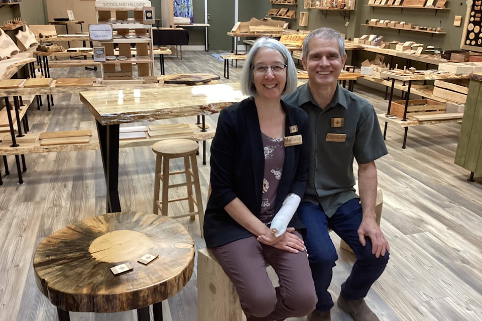Melissa and Ghislain in their storefront in the Waneta Plaza. The couple own Woodland Hillside, a new Trail business that is keeping wood out of landfills and creating beautiful hand-crafted wood products out of rescued lumber. Photo: Sheri Regnier