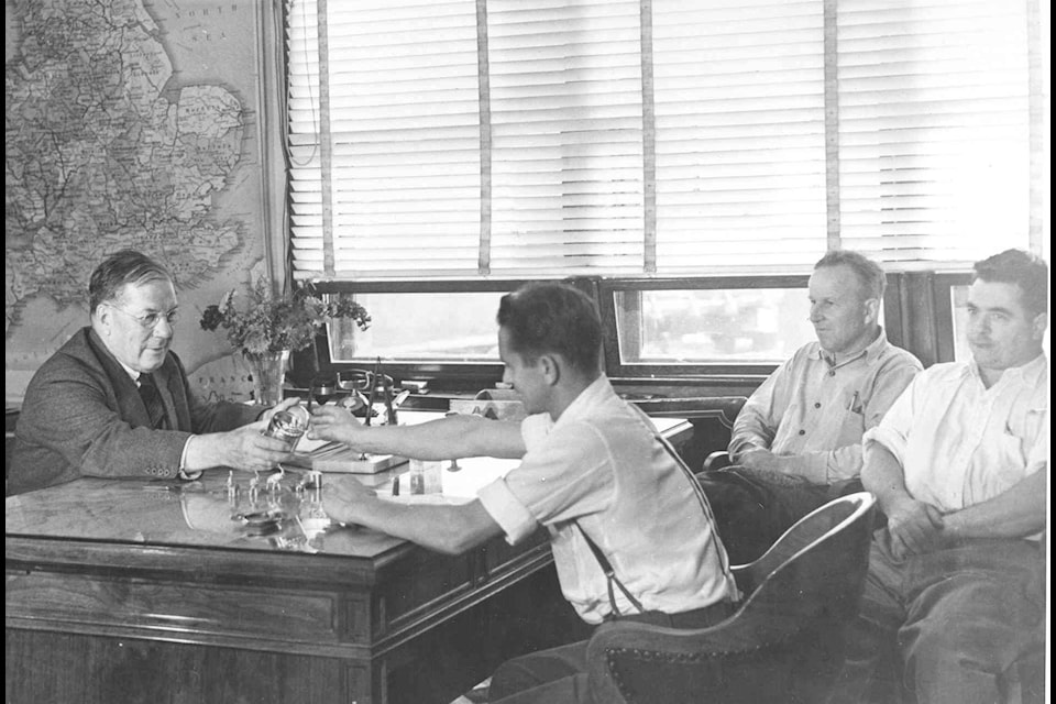 This photo from the Trail Historical Society shows CM&S General Manager S.G Blaylock meeting with members of the Workmen’s Cooperative Committee, the ‘company union’, in 1942. Trail smelter workers had no independent union until 1944.