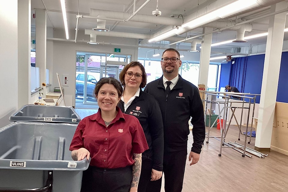 L-R: Deanna Peters, Rachel Olsen and Eric Olsen invite the community to the Saturday grand opening.