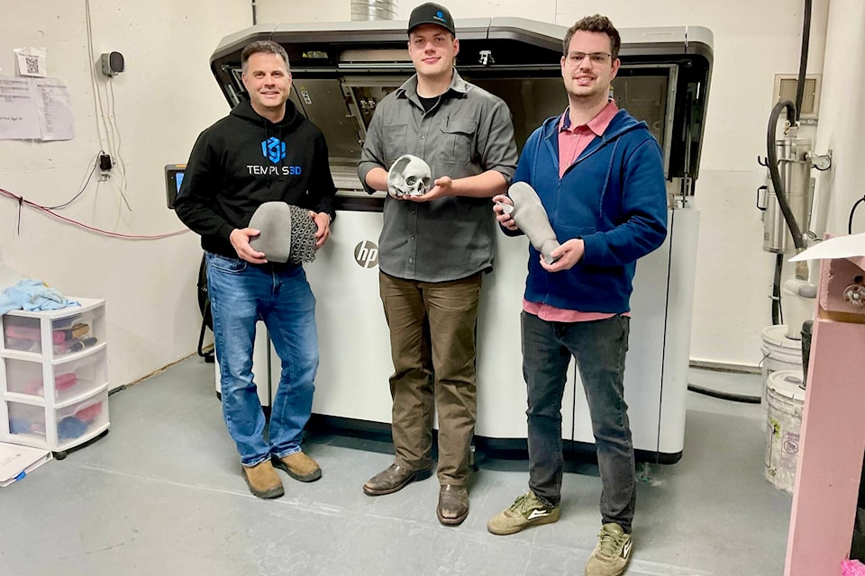 L-R: Robert Bleier, Jordon Shupe and Jonathan Guercio show a few of their prototypes printed from a Multi Jet Fusion 5200 3D printer, located behind them.