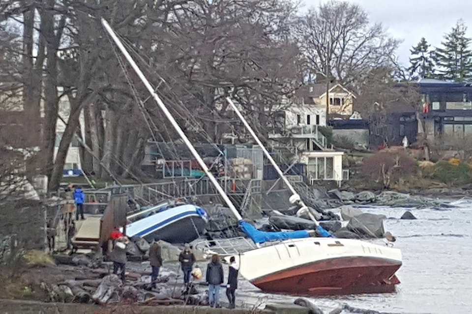 Reader from Oak Bay Brittany MacPherson sent in this image of a sailboat ripped from its mooring and sent into the beach. (Brittany MacPherson/Submitted)