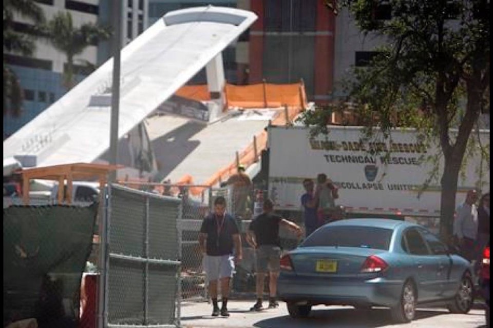 11041272_web1_180315-BPD-M-florida-bridge-collapse