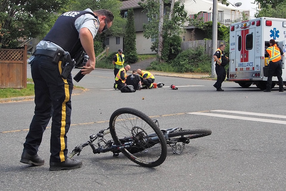 12141677_web1_180605-NBU-Cyclist_hit_by_police_car---P5310740---2