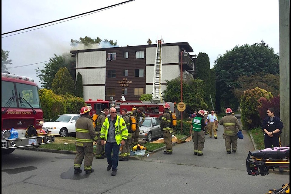 Firefighters rushed to the scene at Dobson Road apartments on Sunday. (Kevin Rothbauer/Citizen)