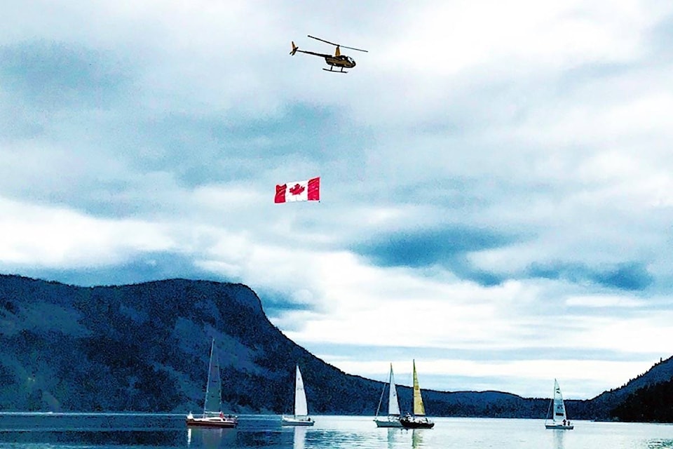 Canada Day celebrations included a special flyby over Quamichan Lake and Maple Bay from a flag-flying helicopter. (Vicki Van Jaarsveld photo)