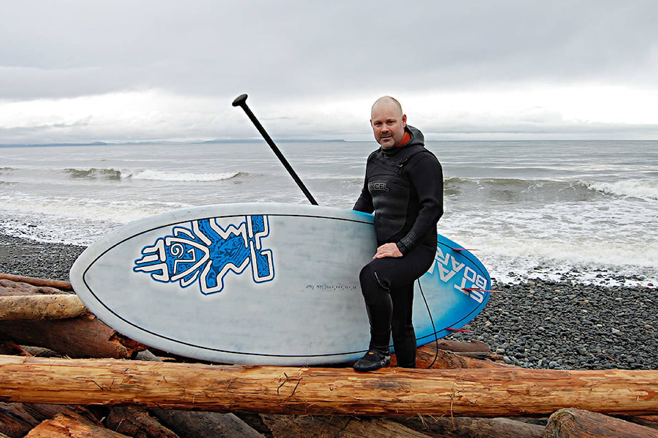 Campbell River resident and surfer Scotty Hewett hit Stories Beach following a wind storm on Tuesday. Photos by David Gordon Koch/Campbell River Mirror