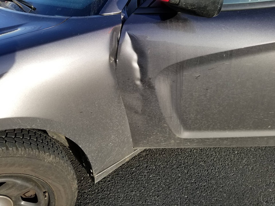 15706363_web1_SPD-Car-Damage