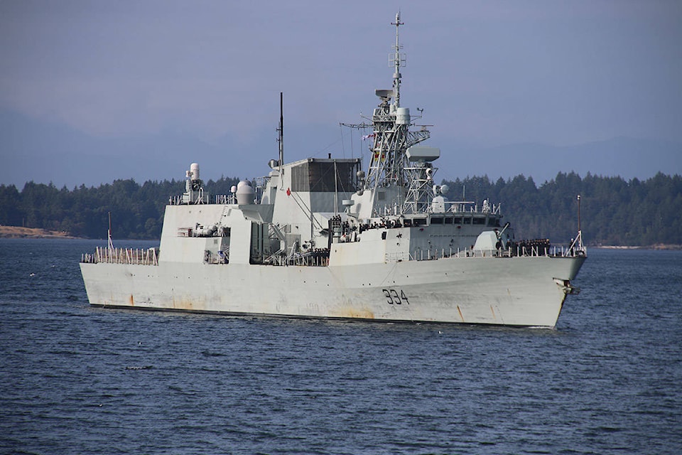 The first glimpse of the HMCS Regina as it returned to CFB Esquimalt on Monday morning. (Kendra Crighton/News Staff)