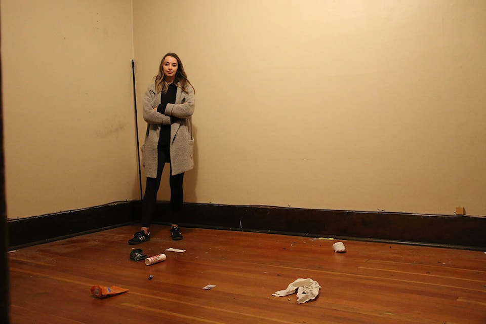 Meg Dunning stands inside the suite she was forced out of last year due to a problem with the sewer in the building. (Kendra Crighton/News Staff)