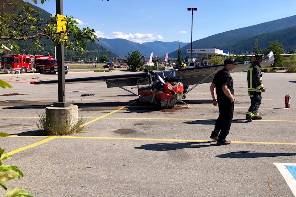 The pilot of a plane that crashed on Monday morning in the Wholesale Club parking lot in Nelson was taken to hospital with minor injuries. Photo: Bill Metcalfe