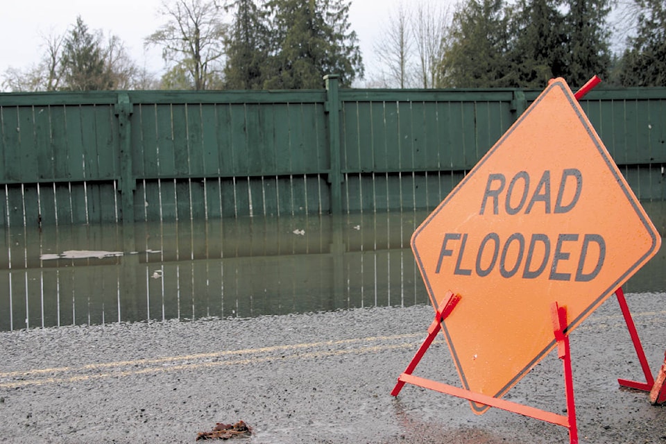23816939_web1_210117-CCI-CVRD-flooding-road-flooded-sign_1