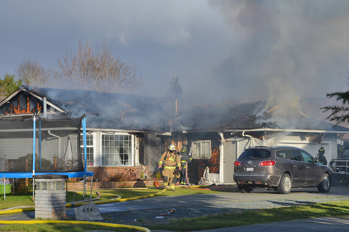 Fire crews called to battle house fire in Parksville Vancouver Island