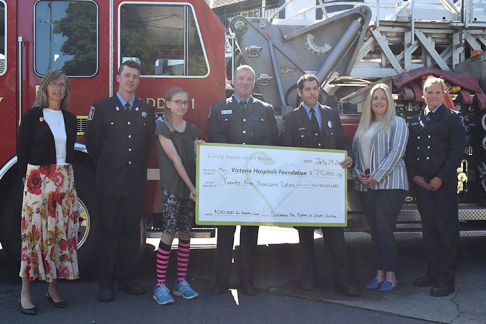 25990062_web1_210729-VNE-Firefighters-VGH-Cheque-photo_2