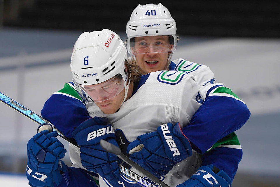 26762984_web1_211013-PQN-podcast-NHL-preview-canucks_1