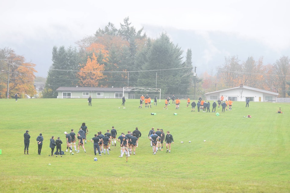 The UBC Thunderbirds and the Pacific Pride warm up before their exhibition game at the Black Sheep Rugby Club on Oct. 23, 2021. (ELENA RARDON / ALBERNI VALLEY NEWS)