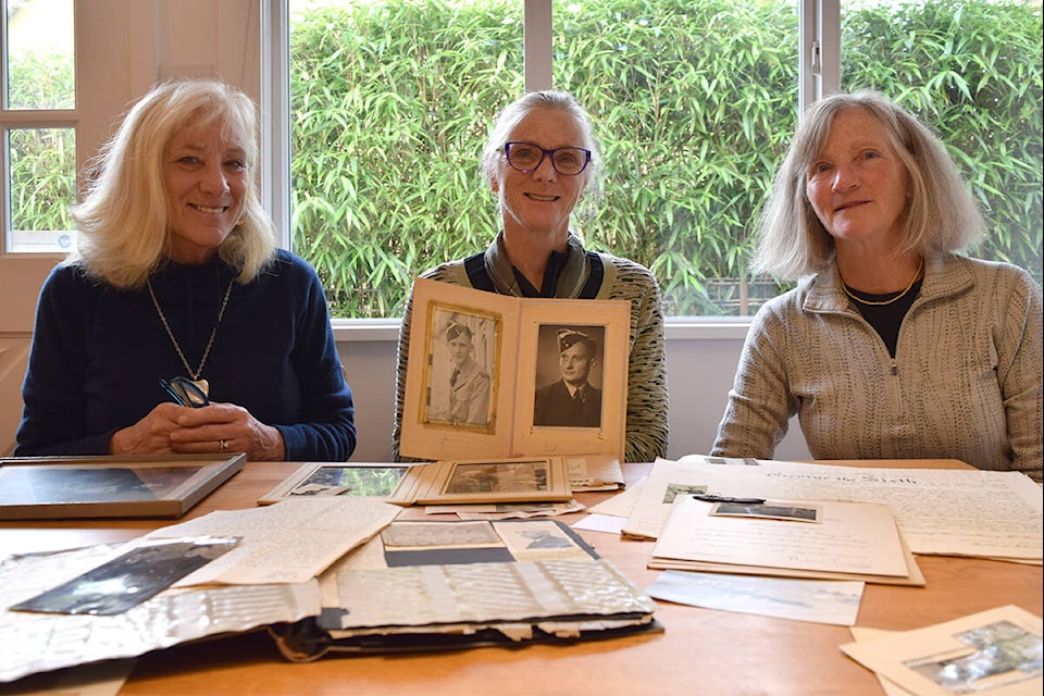 Mary, from left, Margot and Megan Jameson collected the records of their uncle and Second World War veteran, John Bayard, following the discovery of his daughter and their first cousin, Ann, last month. (Kiernan Green/News Staff)