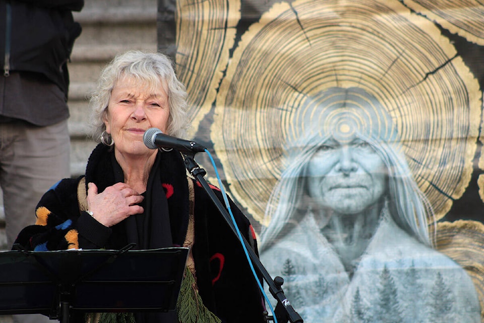 Jackie Larkin, a member of Elders for Ancient Trees, speaks at a rally for old-growth forest conservation outside the B.C. legislature on Feb. 14. (Jake Romphf/News Staff)