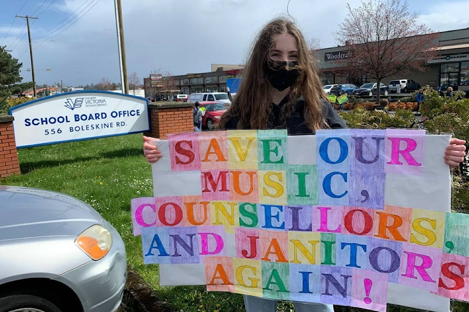 Colquitz Middle School student Quinn McBride protests outside of the School District 61 building, April 4. (Kiernan Green/News Staff)