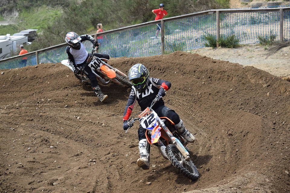 Two riders jockey for position in one of the tight corners. Photo by Marc Kitteringham/Campbell River Mirror