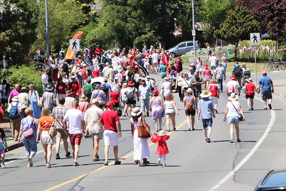 Crowds troop down Gorge Road West at the Gorge Canada Day Picnic on July 1 in Saanich. (Don Descoteau/News Staff)