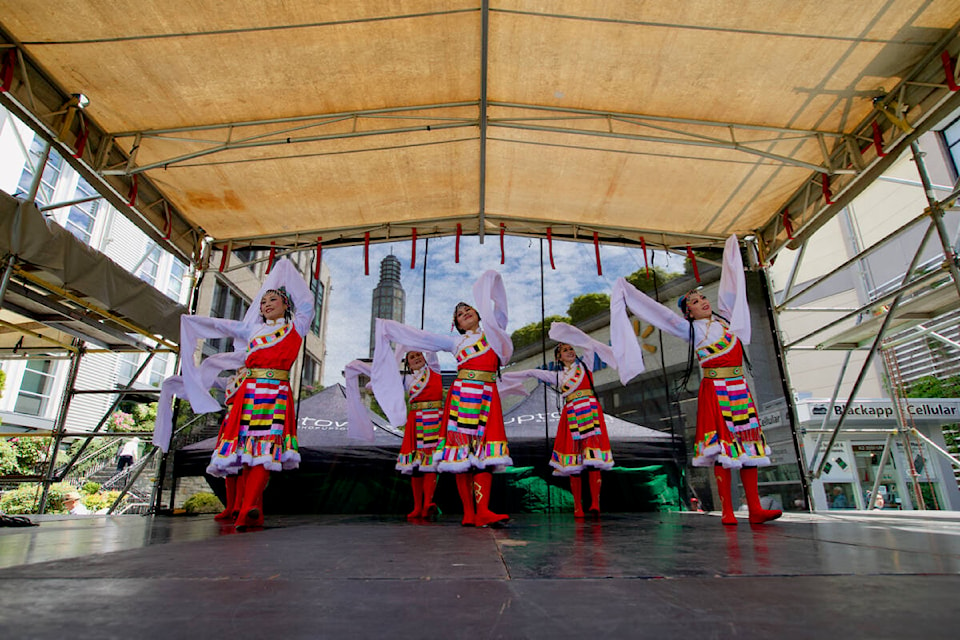 Dancers with the Victoria Sunshine Fitness Club perform Saturday (July 9) at the first annual Uptown Multicultural Festival. (Justin Samanski-Langille/News Staff)