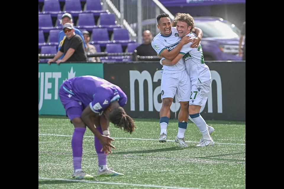 Georges Mukumbilwa hangs his head as York United celebfrates one of their three goals as they beat PFC 3-1 at Starlight Stadium on Sept. 3. (Simon Fearn/Black Press Media)