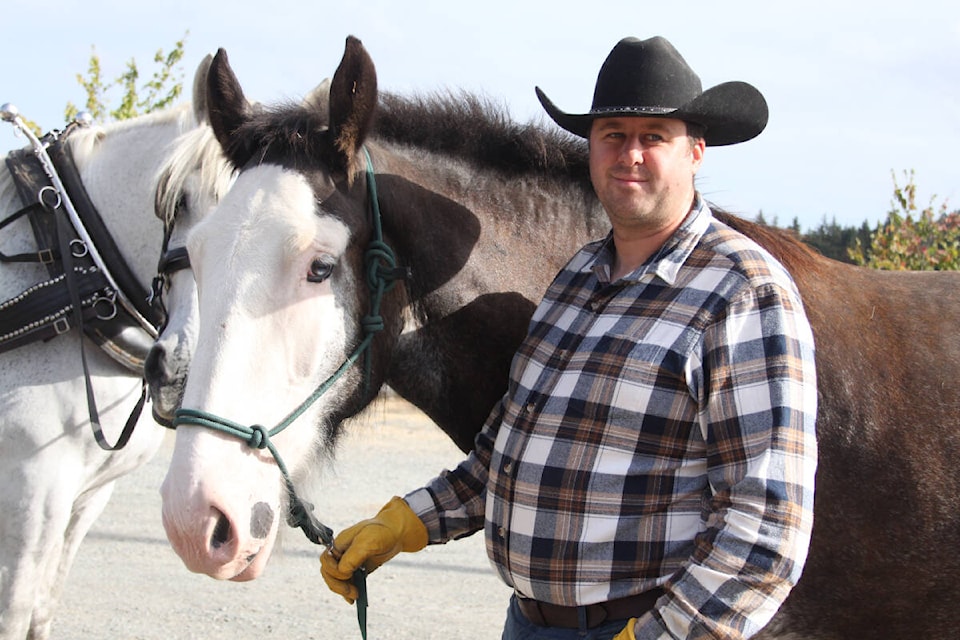 Steve Tyler and Jack wait for their cue at the Cowichan Exhibition, 2022. (Andrea Rondeau/Citizen)