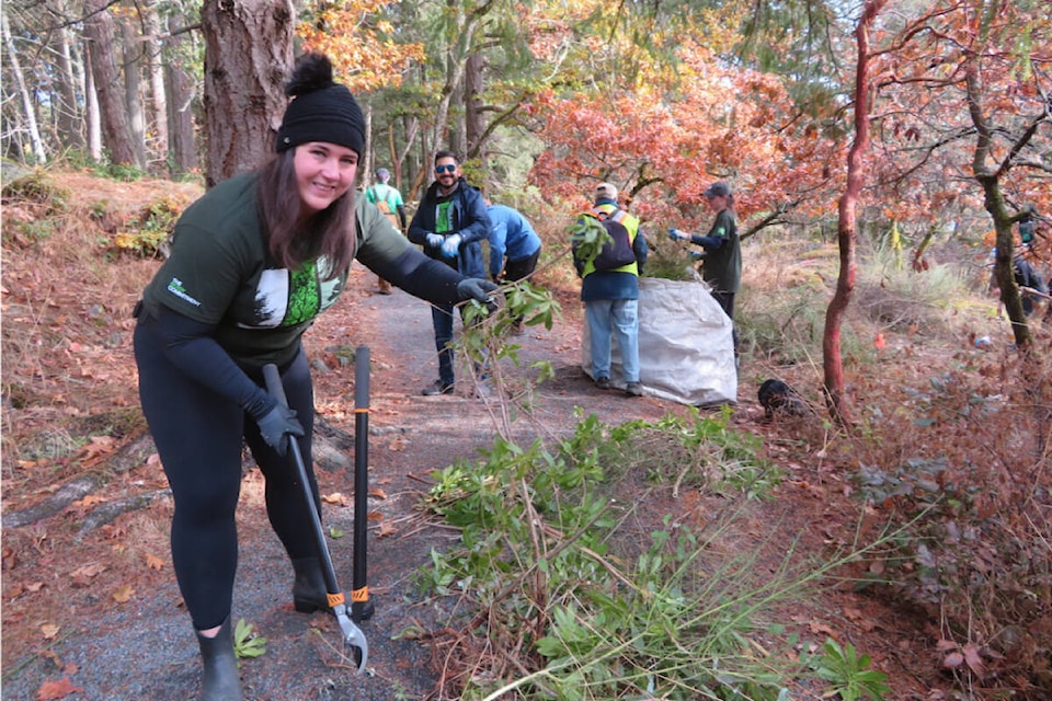 Volunteers remove the equivalent of 75 bathtubs worth of invasive species from View Royal’s Nursery Hill Park during a 2024 event (Courtesy Greater Victoria Green Team)