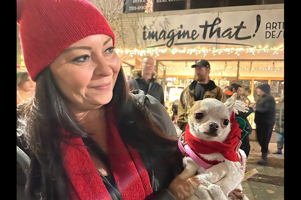 Phoebe the pup gets a lift from her owner during Christmas Kick-off in downtown Duncan Friday evening, Nov. 25. The event was well attended and officially kicked off the season in the city. Check out more from the event on page 30. (Sarah Simpson/Citizen)