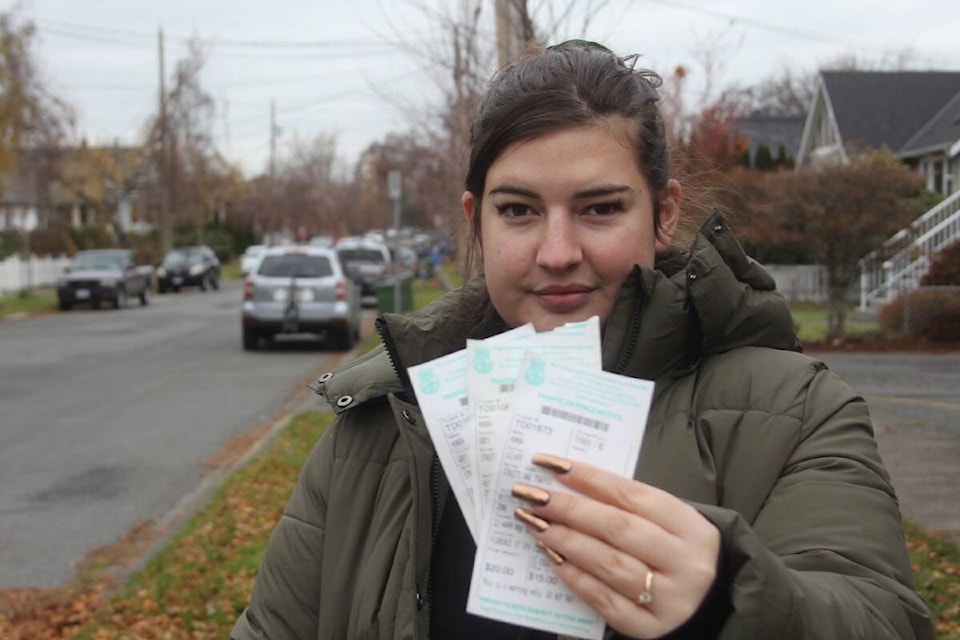 Nicole Canuel says the constant battle for parking, despite being a resident of the street, is just one more irritant when considering a move out of Oak Bay, Greater Victoria and B.C. in general. (Christine van Reeuwyk/News Staff)