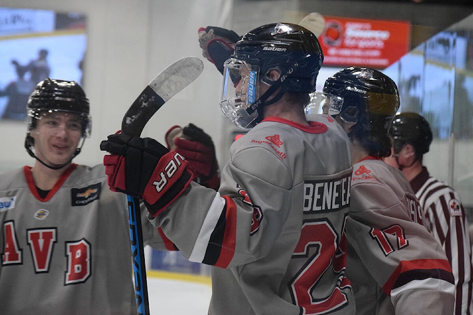 The Bulldogs celebrate Nicholas Beneteau’s first period goal on Sunday, March 5 against the Cowichan Valley Capitals. With the goal, Beneteau claimed the the longest point streak in the BCHL this season at 18 games. (ELENA RARDON / Alberni Valley News)